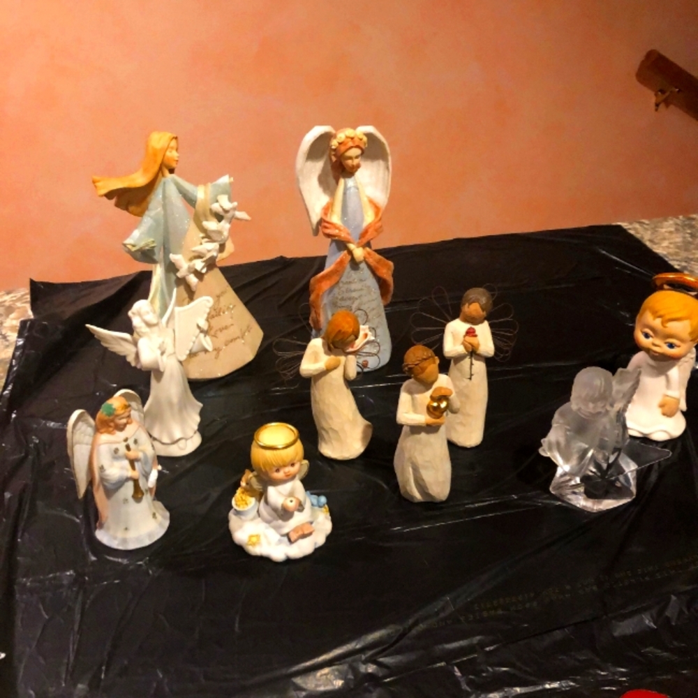 Assortment of Is Angel Figurines.